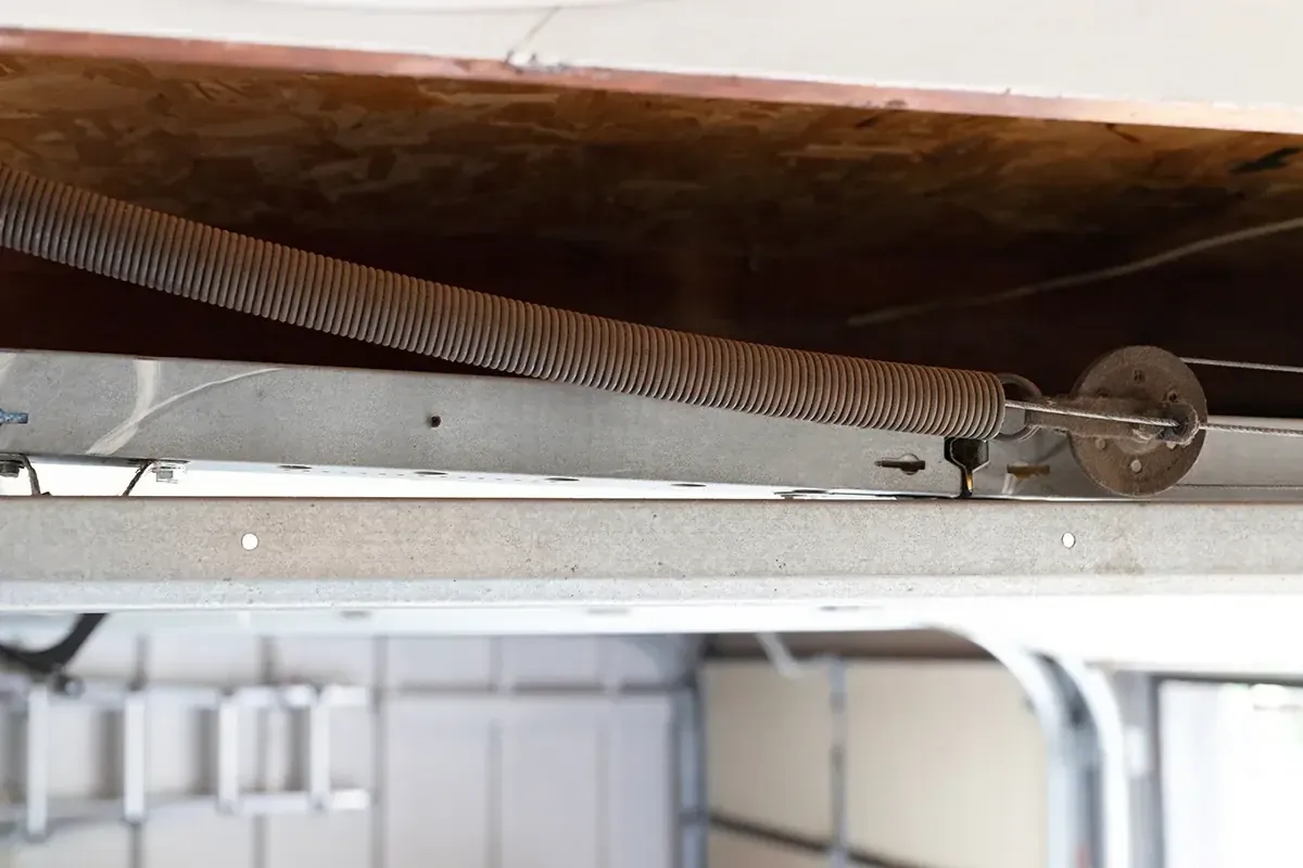 High-strength 7x19 strand aircraft-grade galvanized steel lifting cable repair on residential overhead garage door